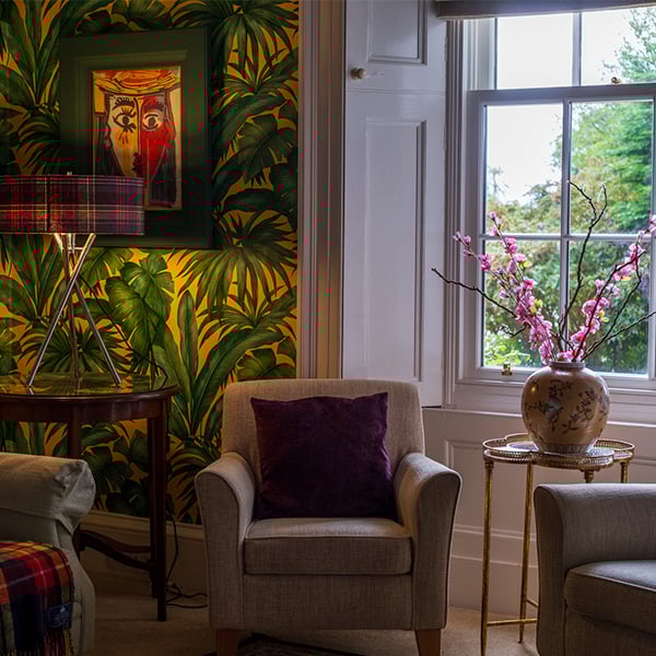 Hotel common space with comfy armchairs