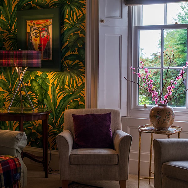 Hotel common space with comfy armchairs
