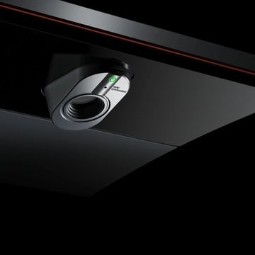 Trackman iO launch monitor device.