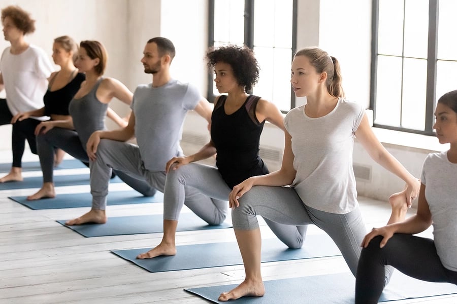 bigstock-Young-Strong-Mixed-Race-People-Pilates