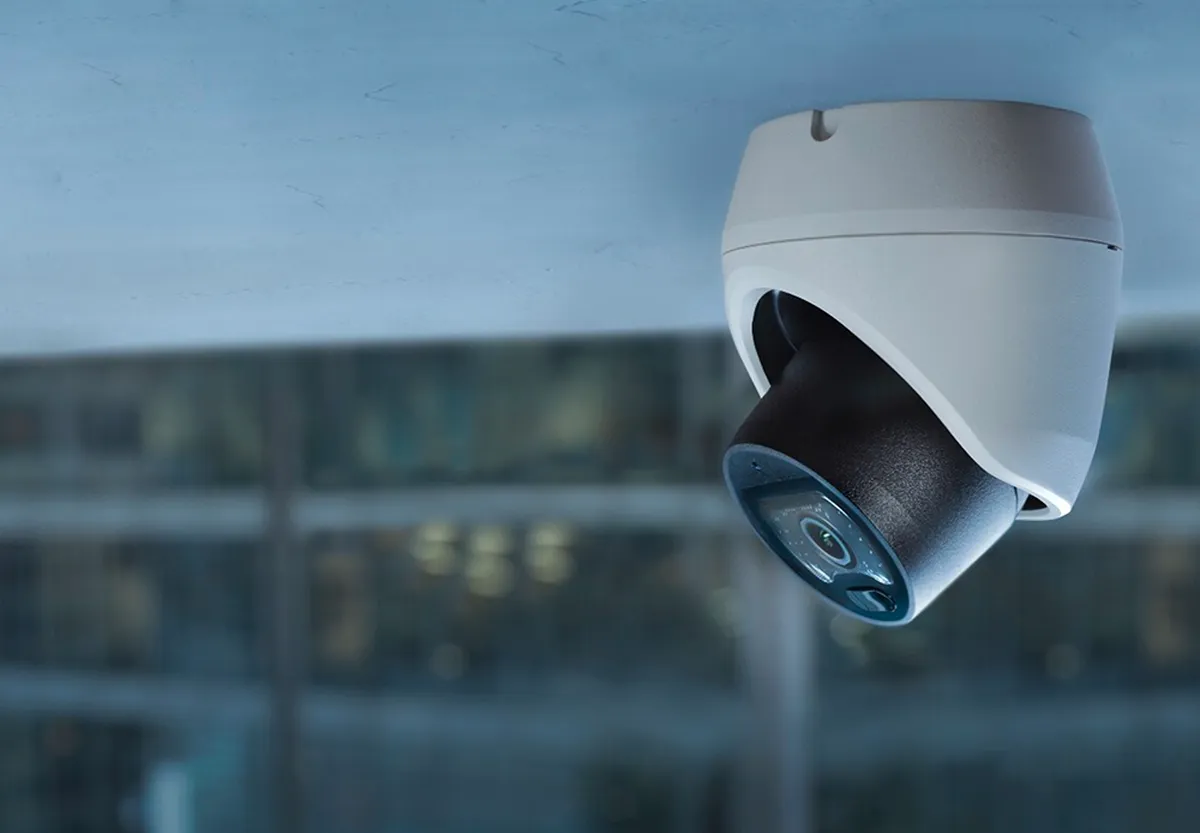 CCTV camera on a ceiling facing left