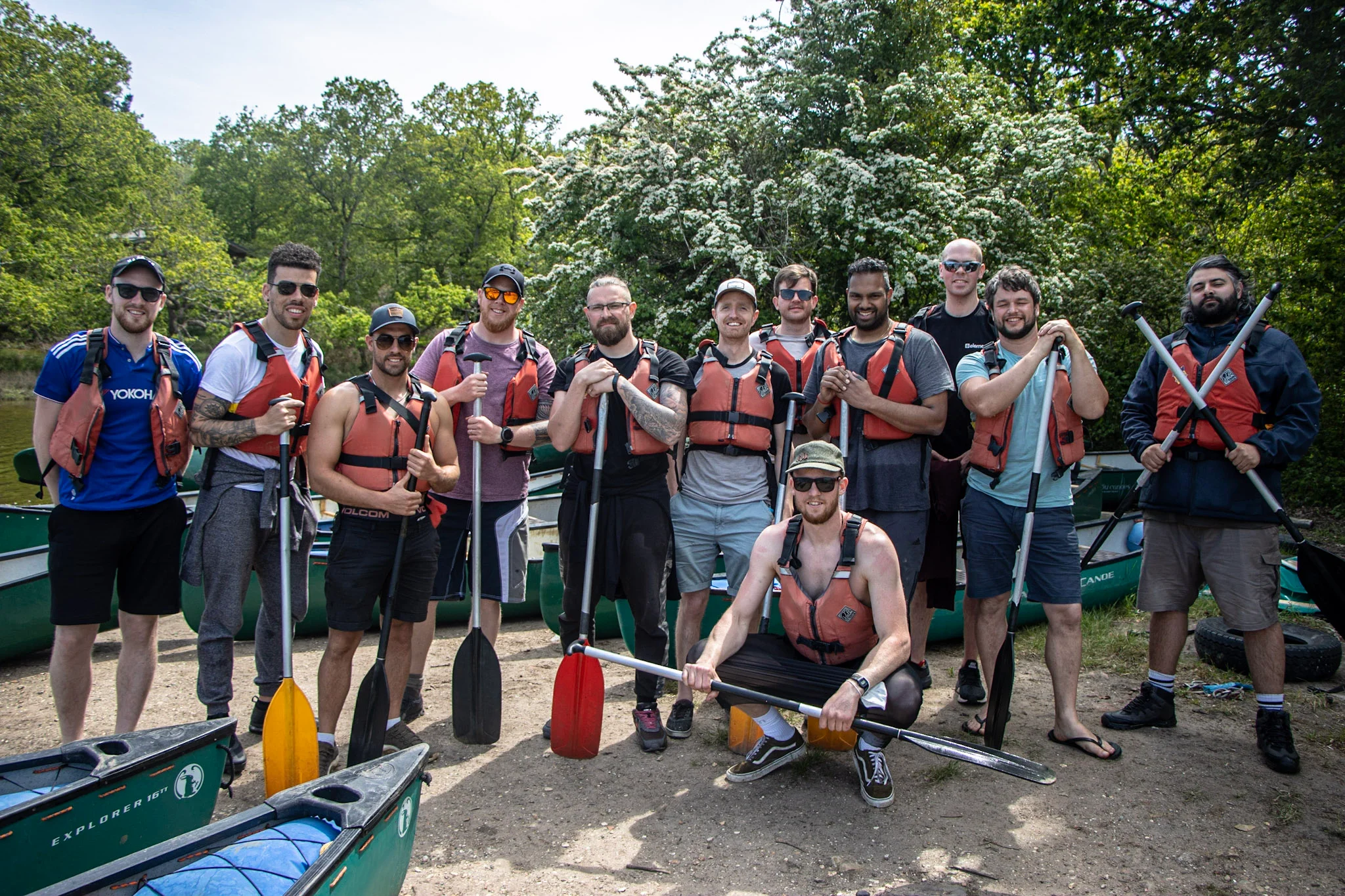 A group canoeing on the River Spey