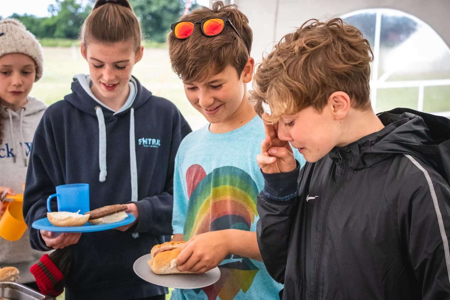 Youth group enjoying meals during a residential trip