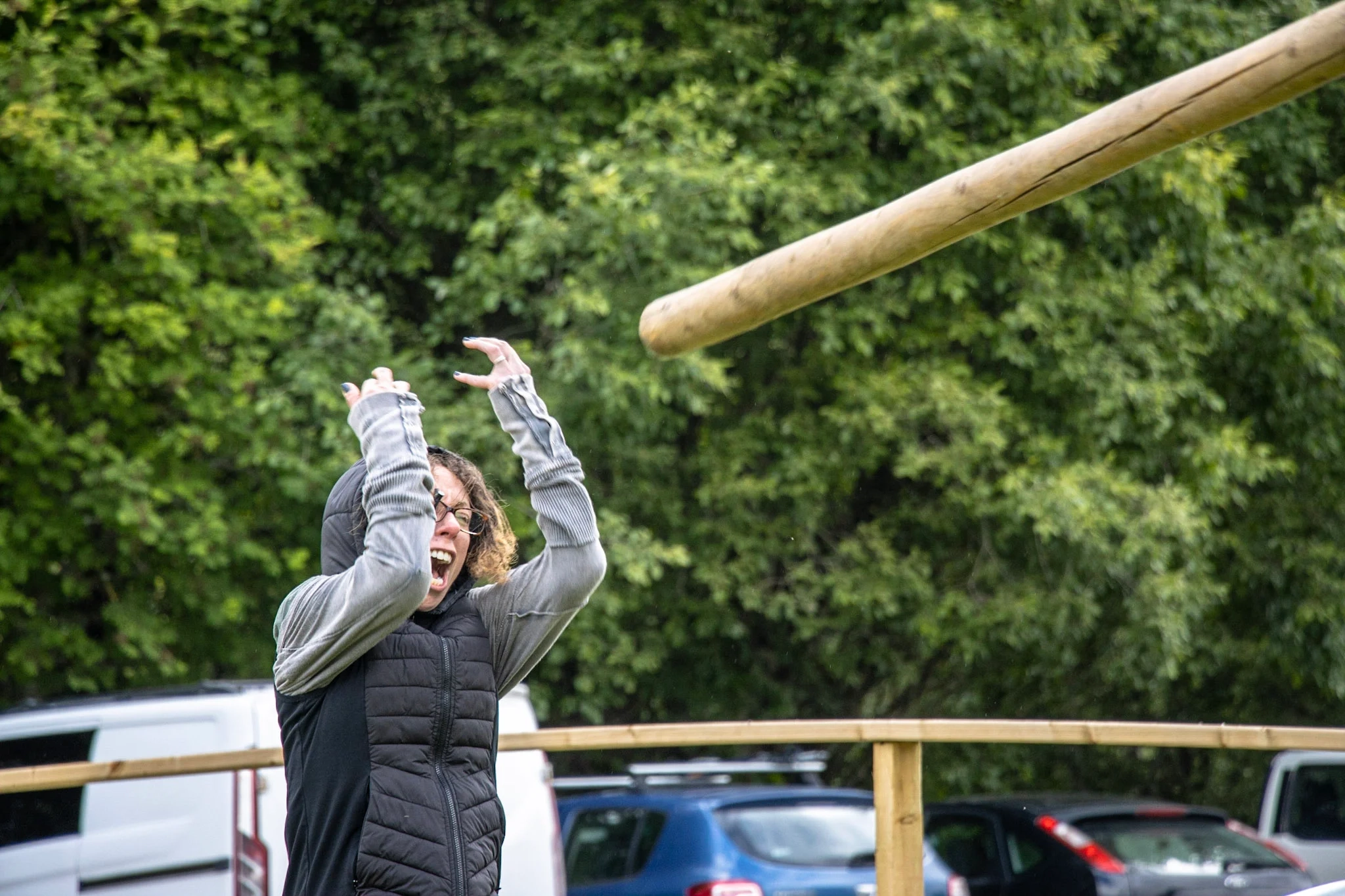Adults taking part in a competitive outdoor group activity