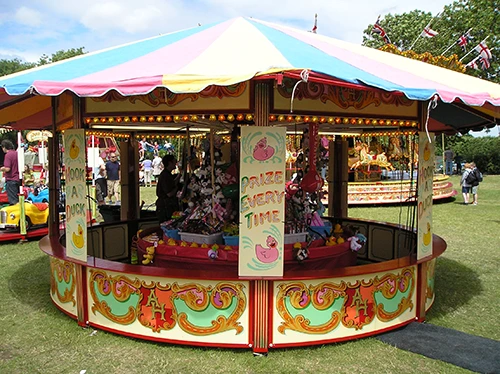 Traditional vintage fairground Hook-a-duck game