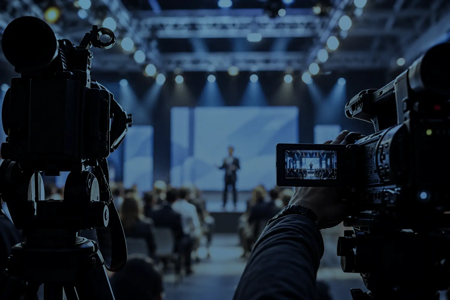 A broadcast camera operator at an event