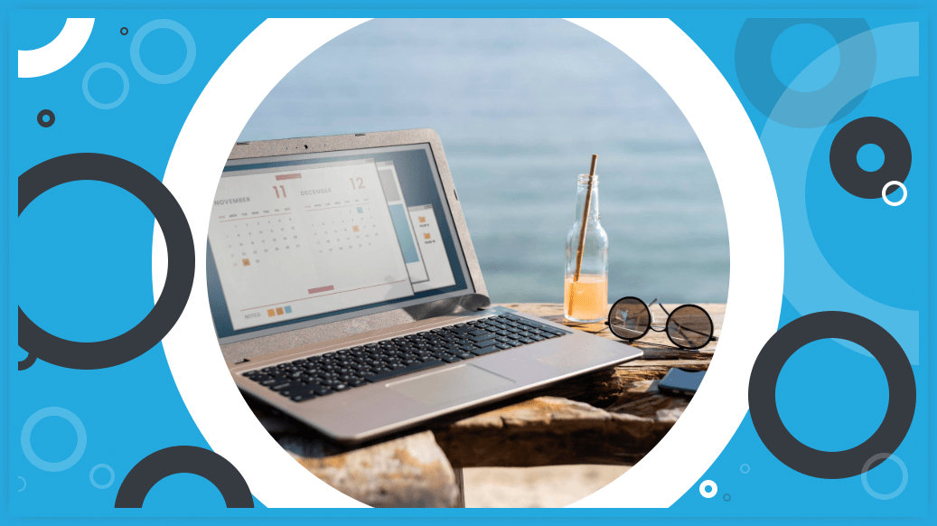 Digital marketing displayed on a laptop screen that is sitting on a sea wall.