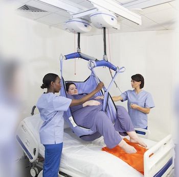 bigstock-Nurses-Moving-Patient-on-gurne-7309120